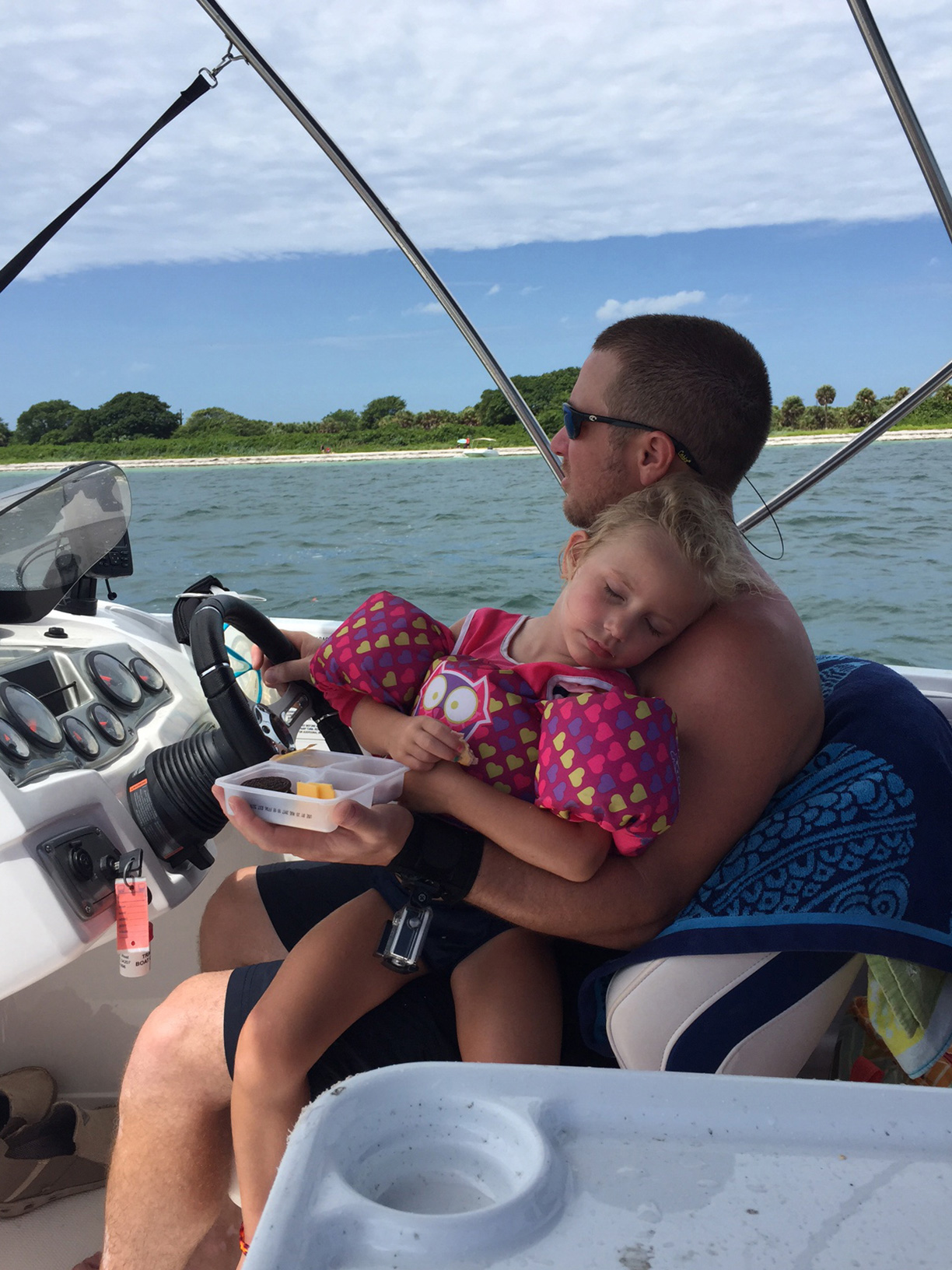 father & daughter in the boat